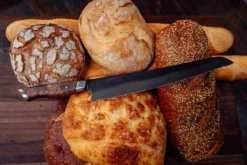 Steelport - 10" Carbon Steel Bread Knife - 65 HRC, Made In USA -Kitchen Supplies Store steelport 10 bread knife loaves 1600x1068 59712.1665153822